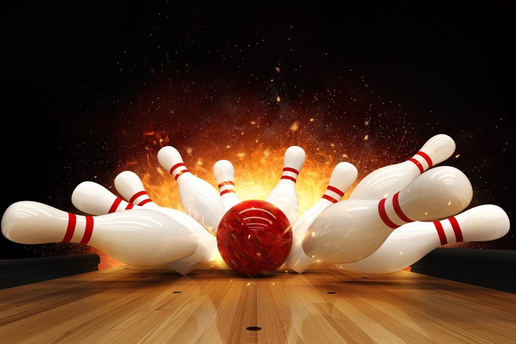 bowling ball hitting pins