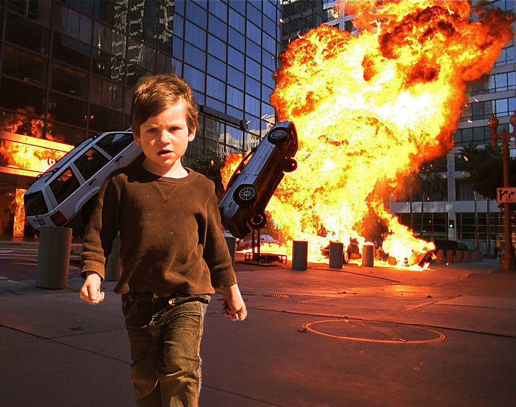 kid with explosion behind him